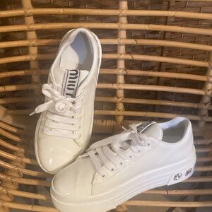 Miu Miu patent leather low-top crystal skate sneakers'